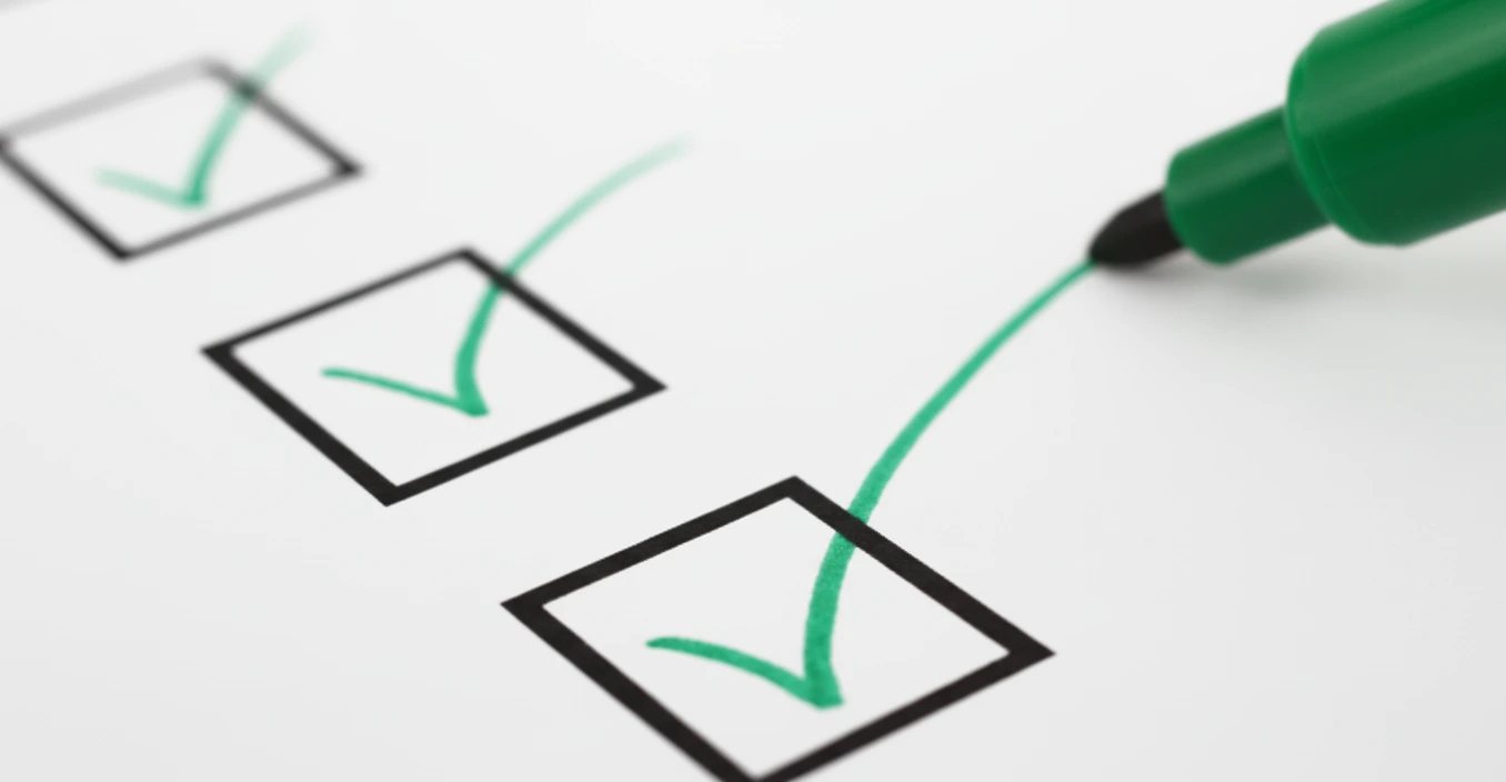 Manager reviewing employee performance goals and metrics during a planning meeting