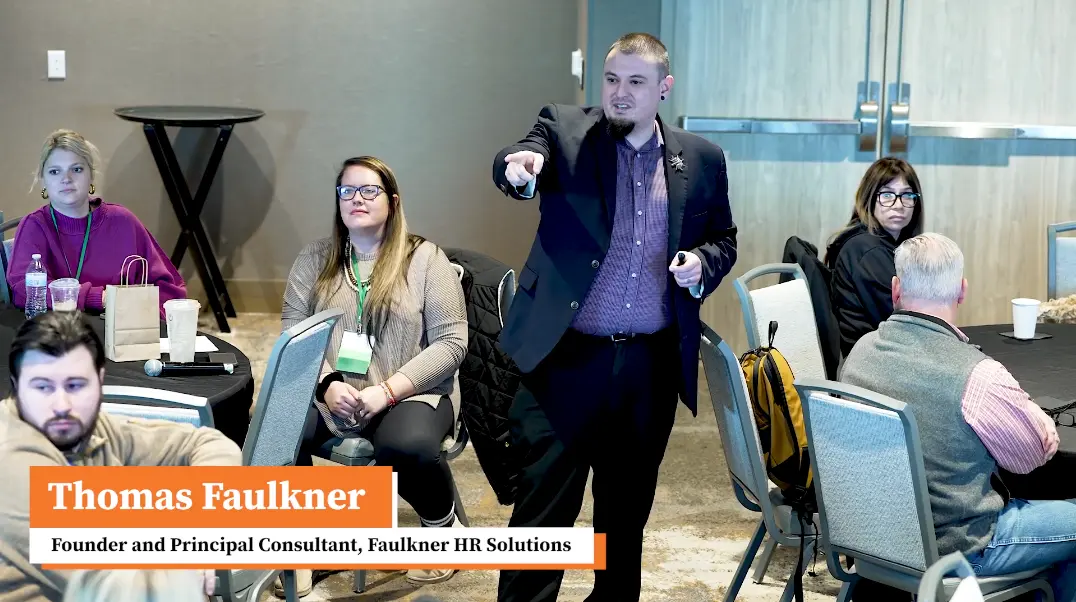 Dr. Thomas Faulkner presenting at a leadership training session